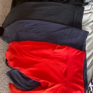 Pack of 3 size large leggings. 1 black, 1 navy, and 1 red. Great condition